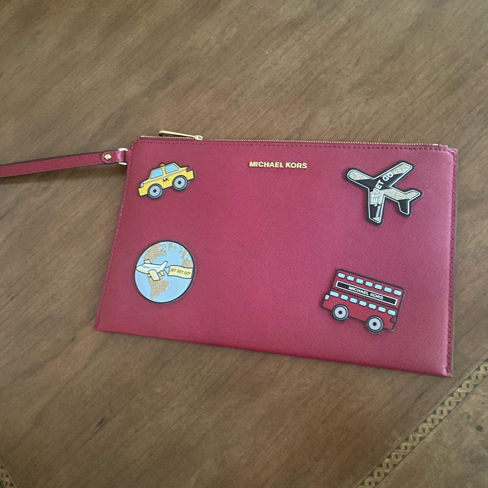 Michael Kors Burgundy Leather Wristlet with Travel Motifs.NEW without tags - Picture 1 of 7